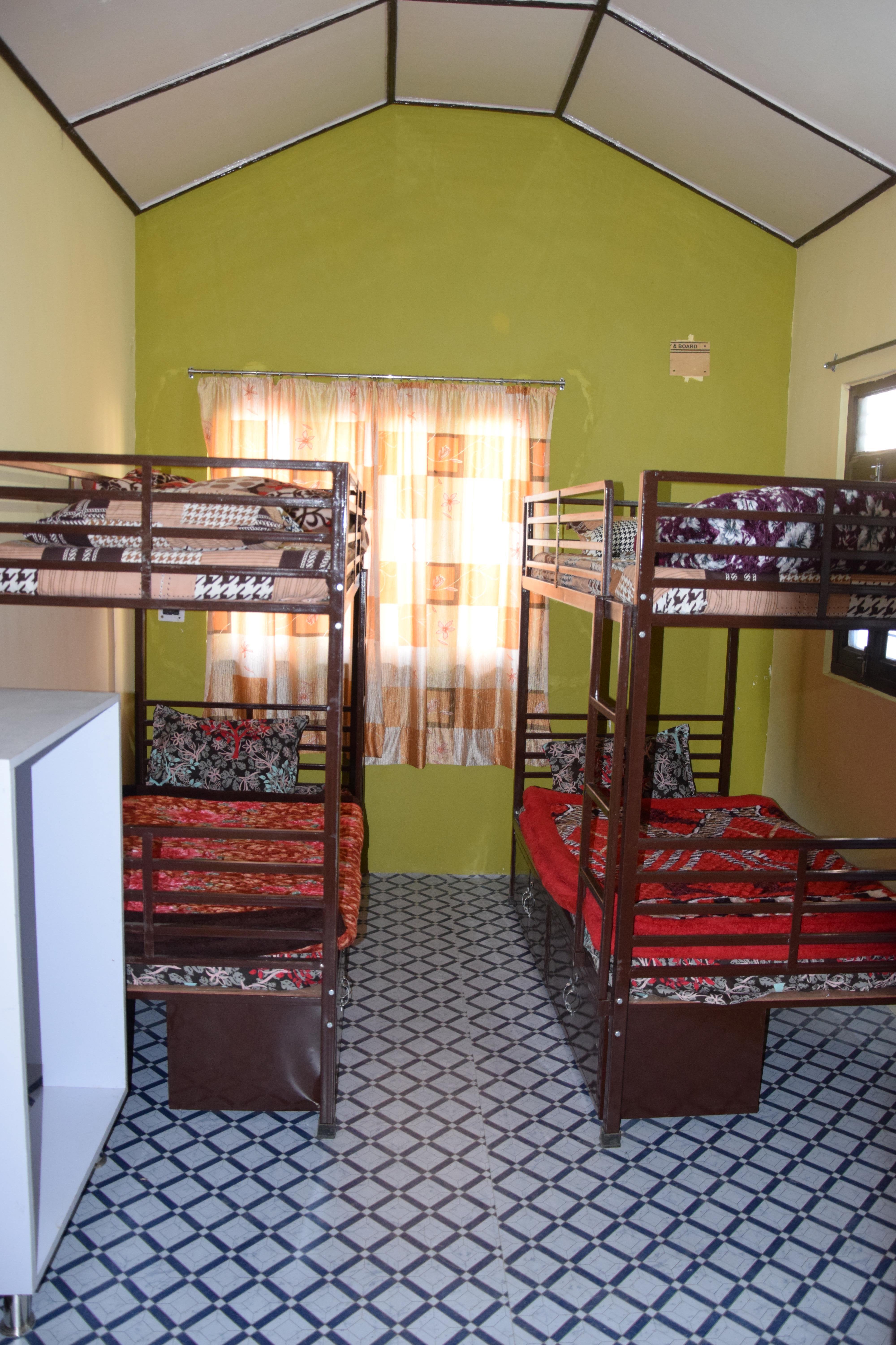 Bunk bed dormitory room at Malti Home Stay, Almora